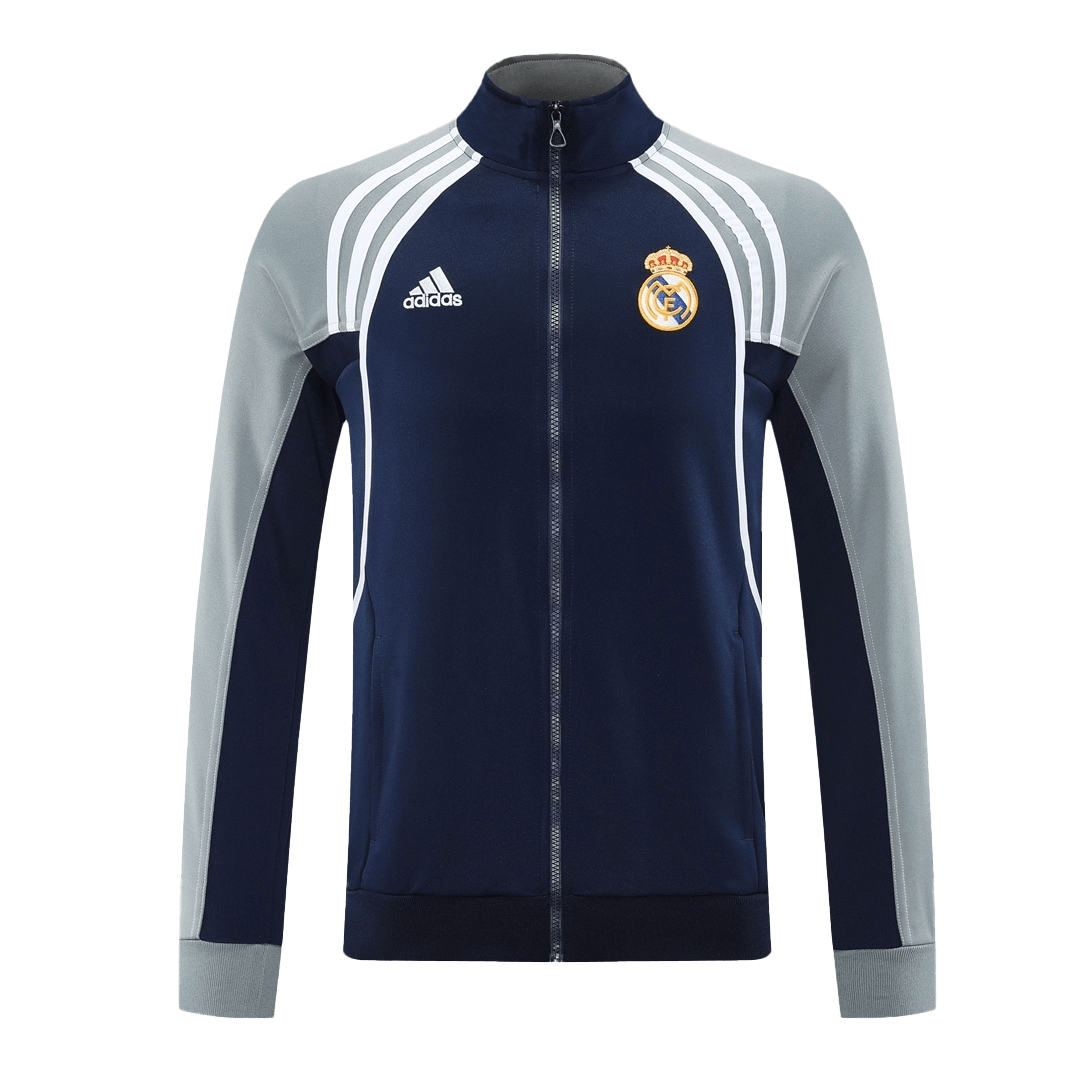Real Madrid Träningsset (Jacka+Byxor)
2025/26 Mörkblå